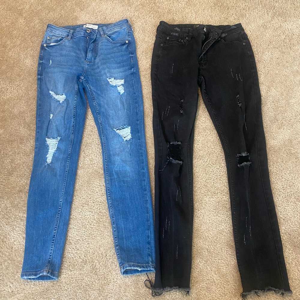 Distressed Blue and Black Jeans
